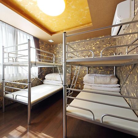 Guesthouse Tiga Κουμαμότο Δωμάτιο φωτογραφία